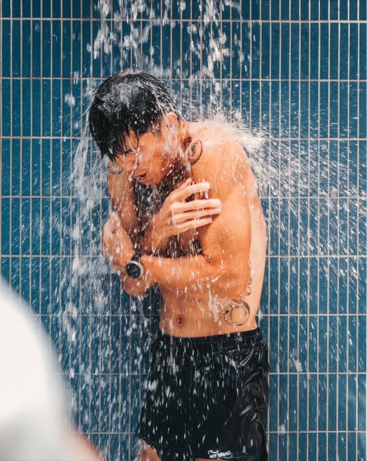 A member bracing under the cold shower